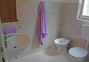 2 bedroom apartment in small residence right on the beach