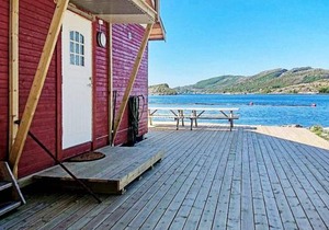 8 person holiday home in Revsnes