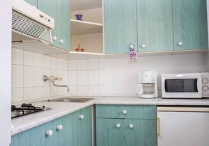 Holiday apartment in an apartment house with pool and internet