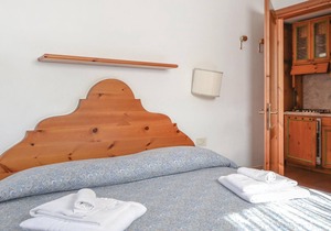 In Sappada, in the province of Udine, this vacation apartment awaits you in a residence located at t