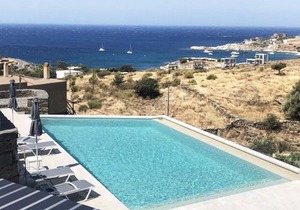 Minimal Apartment with a swimming pool and sea view in Koundouros