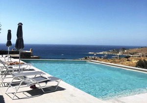 Minimal Apartment with a swimming pool and sea view in Koundouros