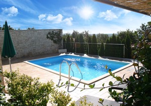 Modern holiday home with pool and fantastic views over nature to the sea