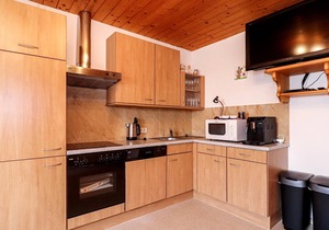 Nestled in a landscape of forests, alpine meadows and mountains, these two vacation apartments (AKA1
