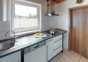 Spacious 8-person vacation home with sauna, fireplace and garden near the beach