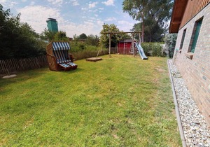 Spacious 8-person vacation home with sauna, fireplace and garden near the beach