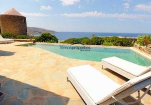 Stone built villa with a swimming pool and a fantastic sea view in Koundouros