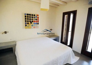 Stone built villa with a swimming pool and a fantastic sea view in Koundouros
