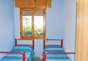 This apartment is located in a residential complex in front of the tourist port of Castelsardo, in S