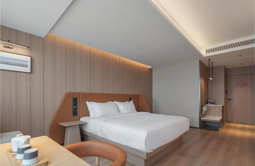 Weidu District Hotel | 桔作酒店 许昌东站胖东来天使城店