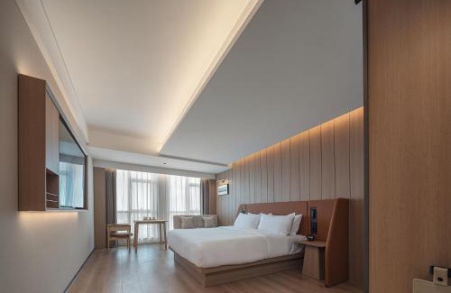 Weidu District Hotel | 桔作酒店 许昌东站胖东来天使城店