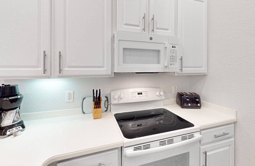 Bahama Bay Condo | 1st floor condo w/shared pools, gym, basketball court, sauna, near theme parks