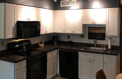 North Wildwood Condo | 2 bed, 2 bath on pool level with private balcony