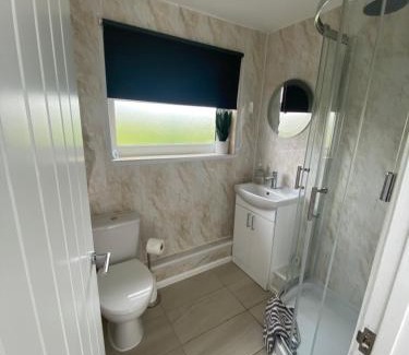 Scurlage Ski Chalet | 2 Bed Bungalow -25 Gower Holiday Village - Dog Friendly