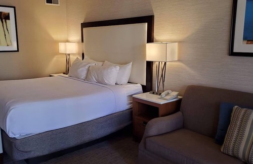 Downtown Resort | 2 King Units for 8! Relaxing Pool, Steps from Golf Course!