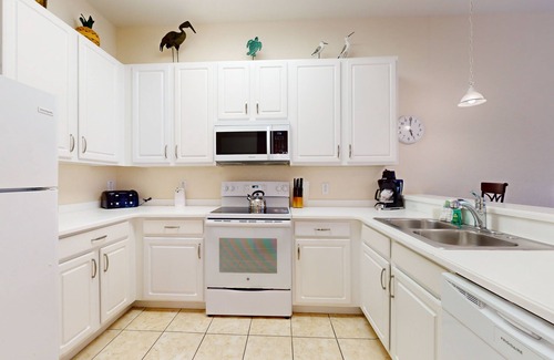 Bahama Bay Condo | 3rd floor condo w/sauna, shared pools, restaurant, gym, balcony