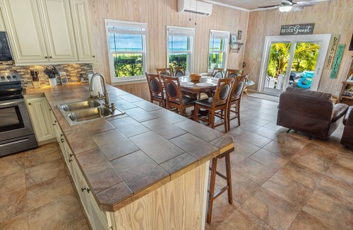 Spanish Wells Cottage | 4 BED 4 BATH: Breath Taking Views, Right On Beach: Free Golf Cart & Kayaks