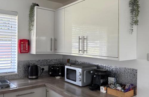 Scurlage House | 46 Gower Holiday Village Swimming Pool Open Until 31 October