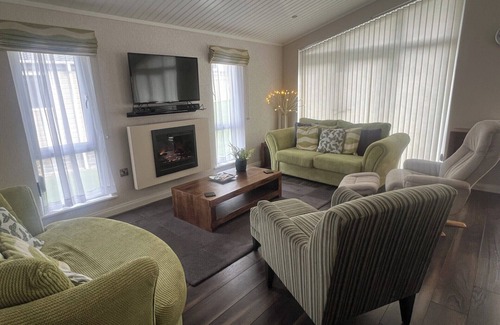 Llanarth Cabin | 71 The Beech House Lodge - A fabulous woodland and coastline escape.