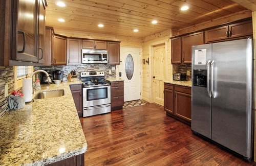 Chalet Village North Cabin | AMAZING 4 Suite Cabin w/VIEWS! Game Room! Theater! 3 Decks! Fire Pit! Hot Tub!