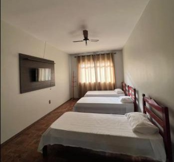 Patos de Minas Apartment | Apartamento 104 - Suíte econômica com ventilador