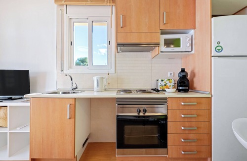 Segur de Calafell Apartment | Apartment 'Dorada 1-2' with Shared Pool, Shared Garden and Wi-Fi