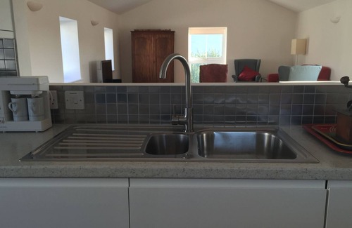 Braye du Valle House | Architect converted granite barn, 5 Star Gold Award