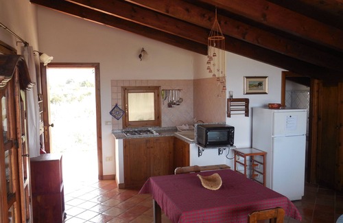 Alghero Apartment | ATTIC STUDIO APARTMENT WITH LARGE VERANDA OVERLOOKING THE SEA