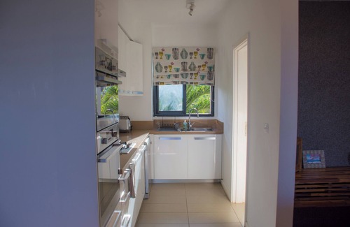 Roches Noires Hotel | Azuri Apartment with Beach, Pools, Gym, Restaurants, Spa, Boats, kids Corner