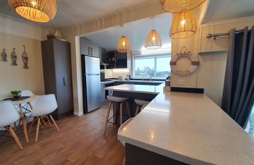 Stanmore Bay House | Beachfront location with seaviews, perched on park like grounds