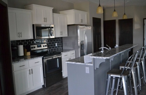 Arnolds Park House | Beautiful 4 BDRM/3 BATH home in Bridges Bay-Pool in backyard & garage rec room!