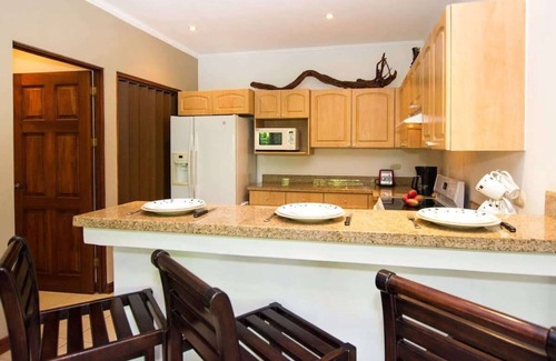 Playa Flamingo Condo | Beautiful Condo in Peaceful Cliffside Location with a Private Balcony & Stunning