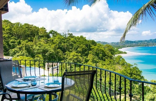 Playa Flamingo Condo | Beautiful Condo in Peaceful Cliffside Location with a Private Balcony & Stunning