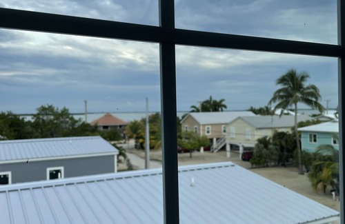 Breezeswept Beach Estates House | Beautiful House on Ramrod Key with boat slip and easy water access.