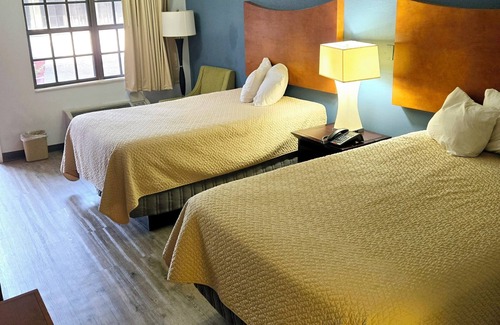 Orange Hotel | Best Price Motel and Suites