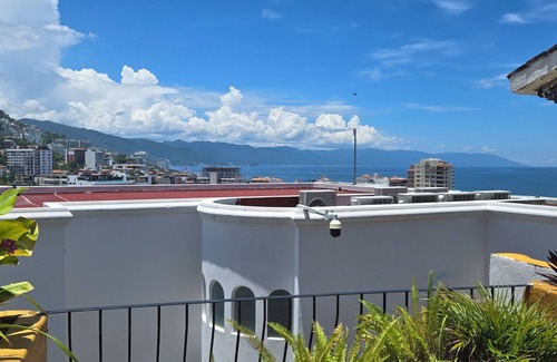 Downtown Puerto Vallarta Apartment | Big sun terrace with view over old town and ocean.