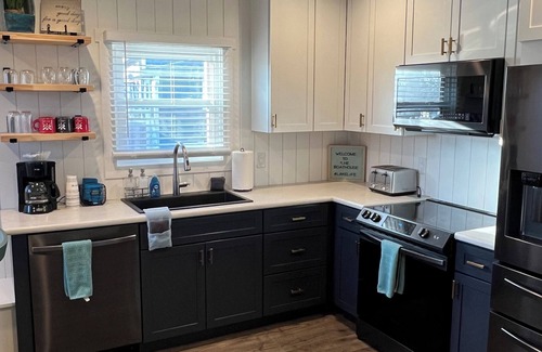 Arnolds Park House | BPO Boathouse. 4 bed/2 bath completely updated home in the heart of AP/Okoboji!