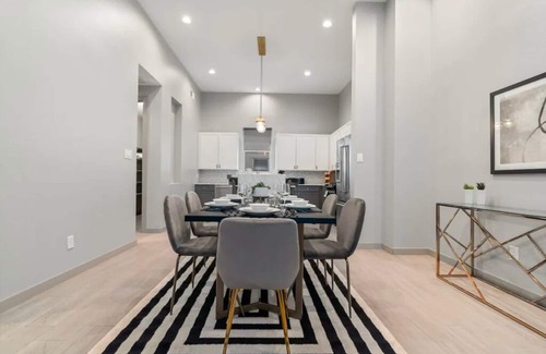 Bryan Place House | Breathtaking 4 Story Townhome w/Skyline Views, Space for All!