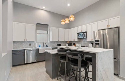 Bryan Place House | Breathtaking 4 Story Townhome w/Skyline Views, Space for All!