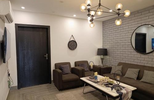 Bahria Town Apartment | Brick Accent Loft 1BHK with Balcony & Free Netflix