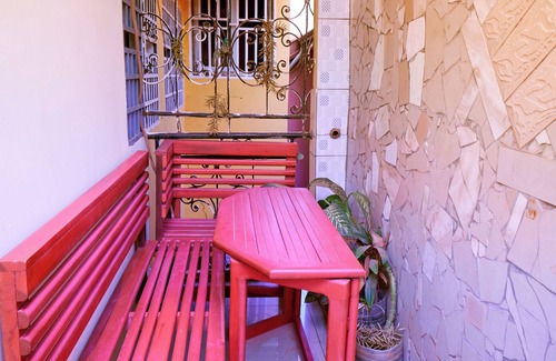 Yaounde Apartment | Bright, cozy apartment, where mustard yellow creates a warm ambience.