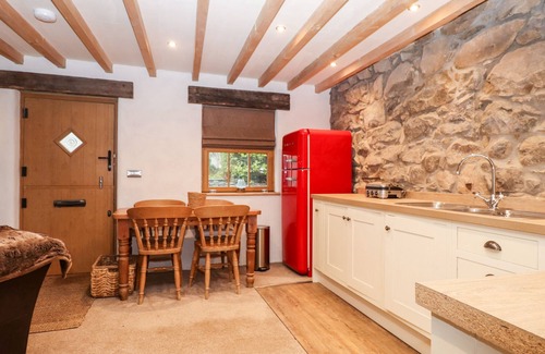 Nefyn Cottage | BULL BACH (OLD SMITHY), pet friendly, with a garden in Nefyn