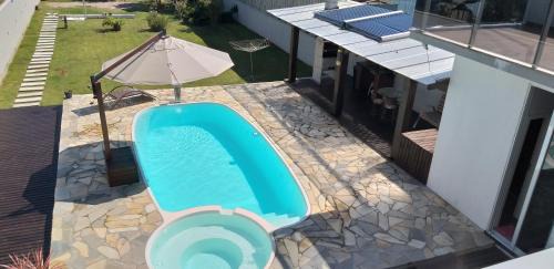 Bombas House | Casa com Piscina e Hidromassagem Montoski