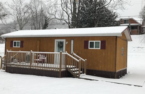 Mc Carr Cabin | Charming 2-bedroom cabin in McCarr, KynPet friendly! Lots of lighted parking!
