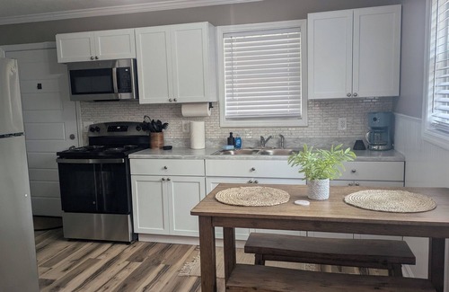 Clearfield House | Charming 2-bedroom house with Hot Tub 1.5 miles from Cave Run lake