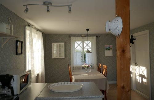 Laholm Cottage | Charming red cottage on the Swedish countryside, near the sea and forest.