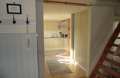 Laholm Cottage | Charming red cottage on the Swedish countryside, near the sea and forest.