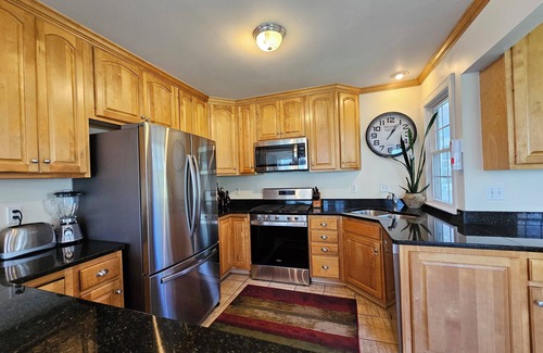 Powers Lake House | Classic Lake House on Powers Lake with boat house! Pet-friendly!