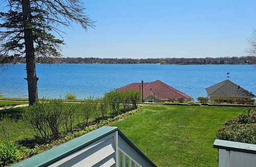 Powers Lake House | Classic Lake House on Powers Lake with boat house! Pet-friendly!