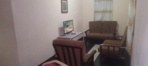 Freetown House | Comfort Zone Furnished Apartments